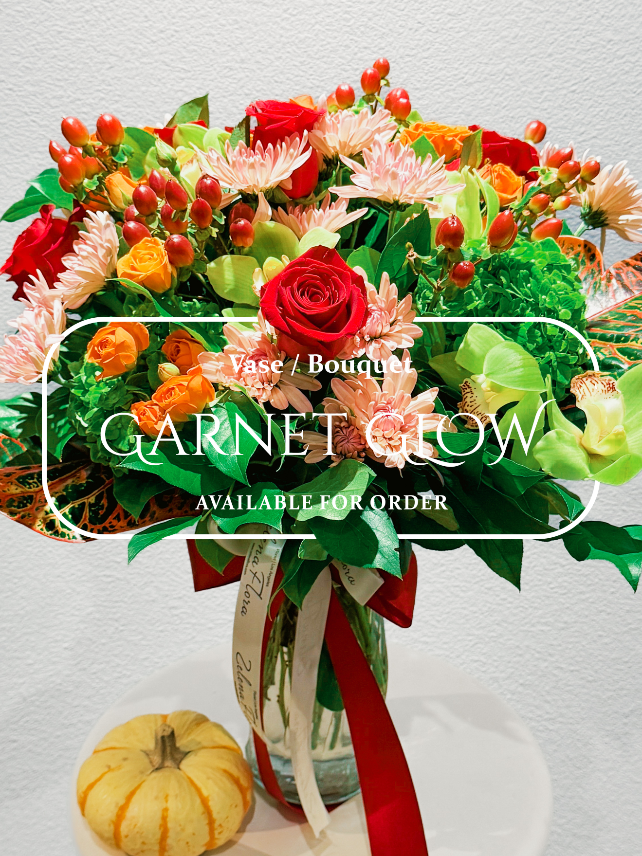 Colorful bouquet with pumpkins on a white background, featuring 'Garnet Glow' vase/bouquet.