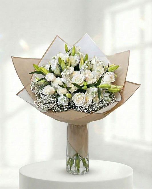 White Angel bouquet with white roses, lilies, and baby’s breath by Zelenaflora in Los Angeles