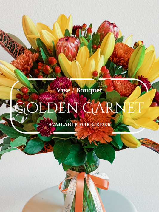 Colorful bouquet with 'Golden Garnet' text overlay on a light background